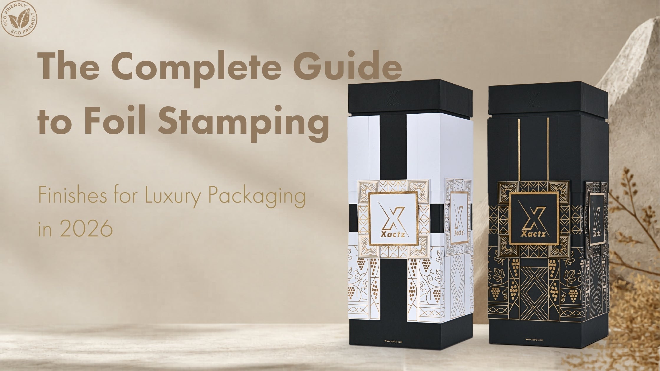 Blog post cover for The Complete Guide to Foil Stamping Finishes for Luxury Packaging in 2026, displaying an eco-friendly badge next to premium black and white custom rigid column boxes by Xactz Packaging.