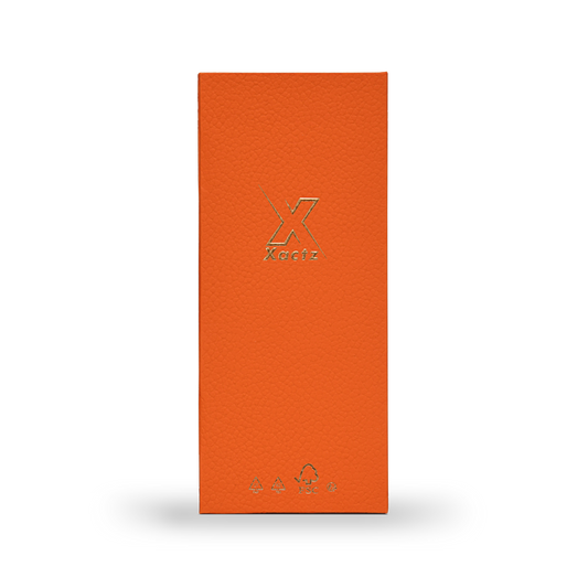Boîte de luxe personnalisée avec couvercle rabattable orange, feuille d'or mat et ruban de soie