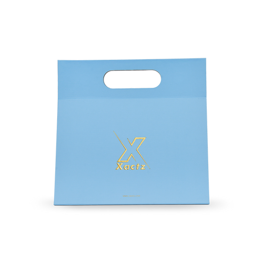 Sac de shopping de luxe personnalisé bleu avec poignées découpées et film or pour emballage