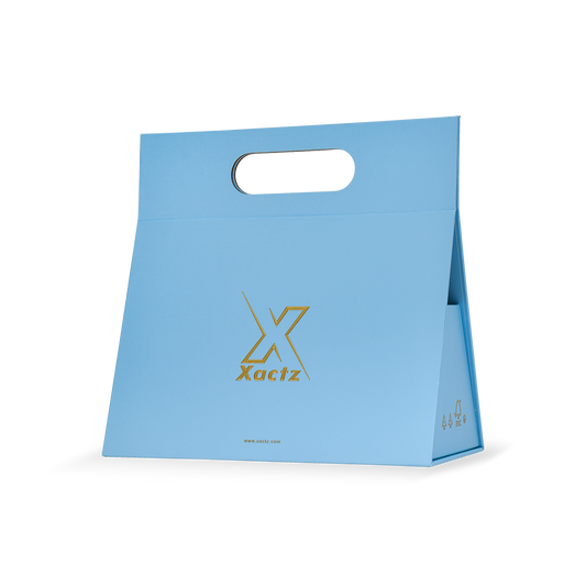Sac de shopping de luxe personnalisé bleu avec poignées découpées et film or pour emballage