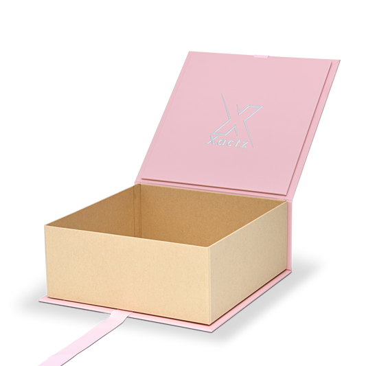 Boîte en carton de luxe rose personnalisée pliable avec ruban et détails en feuille d'argent
