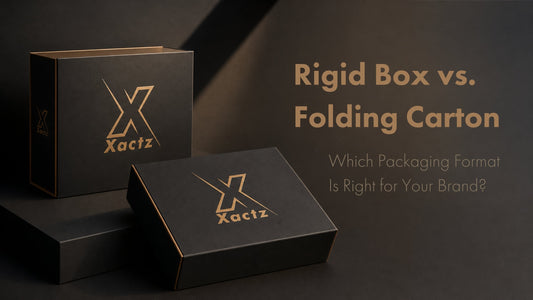 Compare rigid box vs folding carton custom packaging styles. Two premium matte black boxes with gold Xactz logos. Find the right format for your brand.