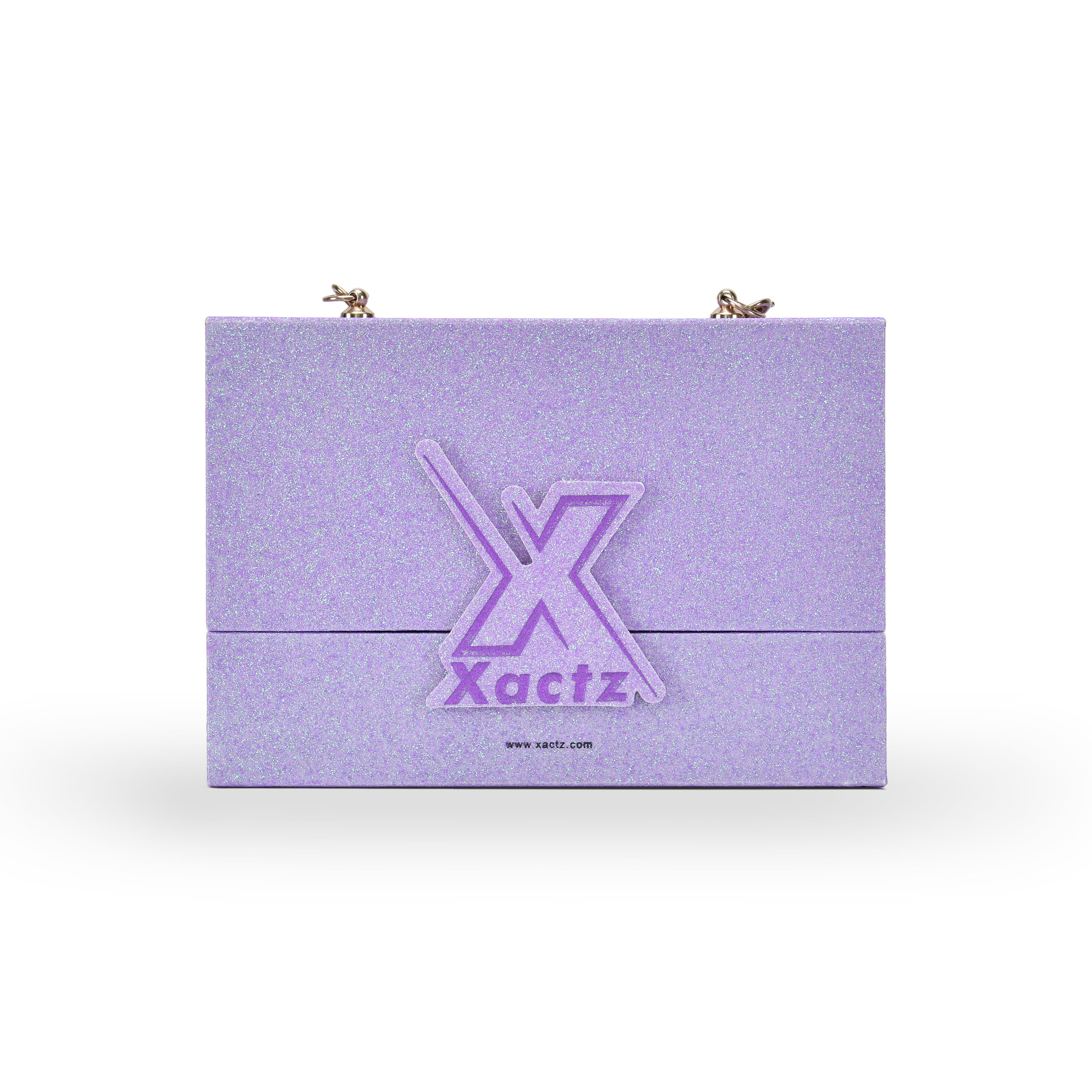 Custom purple glitter rigid makeup gift box with luxury chain handle showing the full front panel covered in iridescent purple glitter specialty paper with a large embossed purple gold foil Xactz logo in the center and two gold chain attachment hardware clips at the top corners