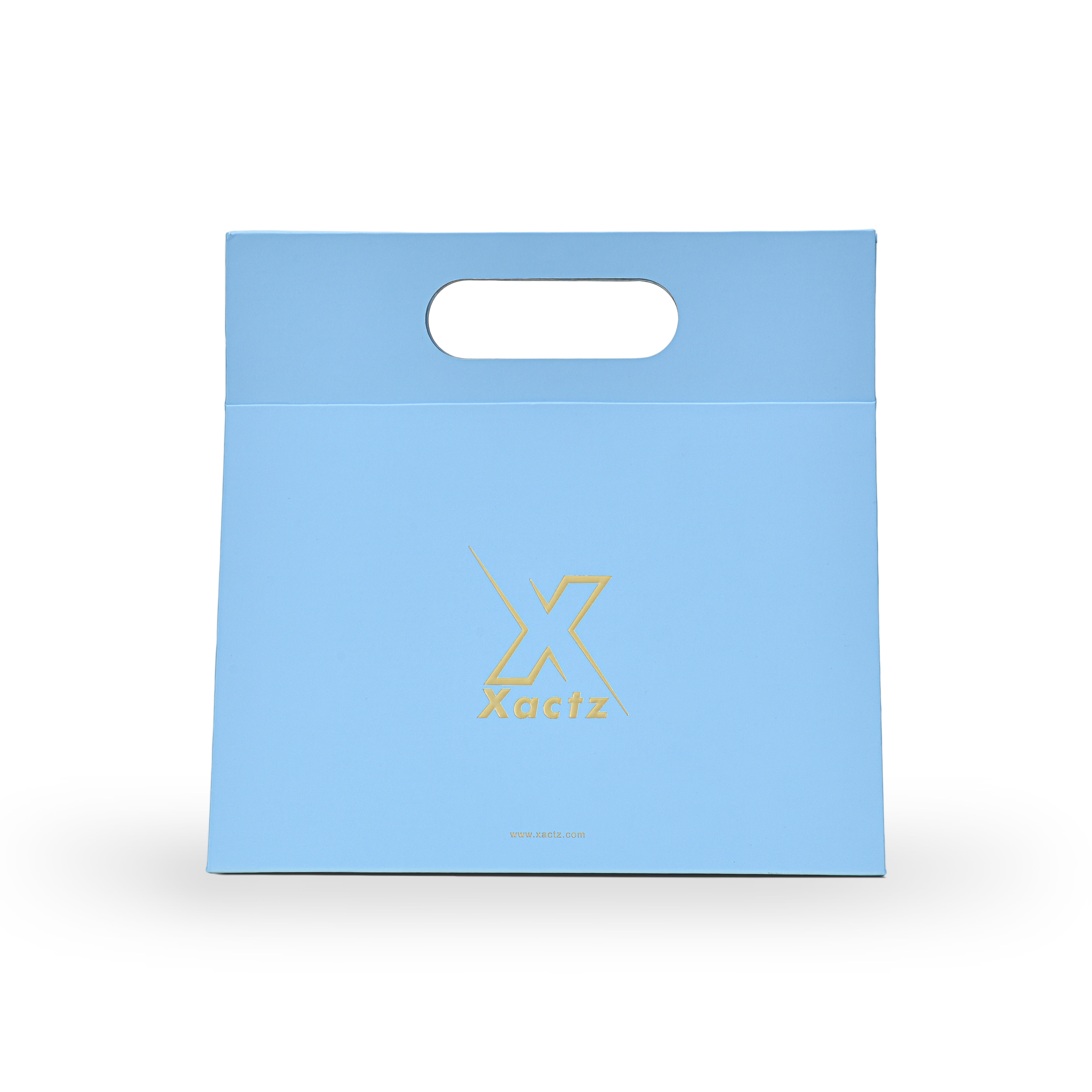 Custom foldable gift box bag with die cut carry handle in sky blue art paper featuring an embossed gold foil Xactz logo centered on the front panel with soft touch lamination finish