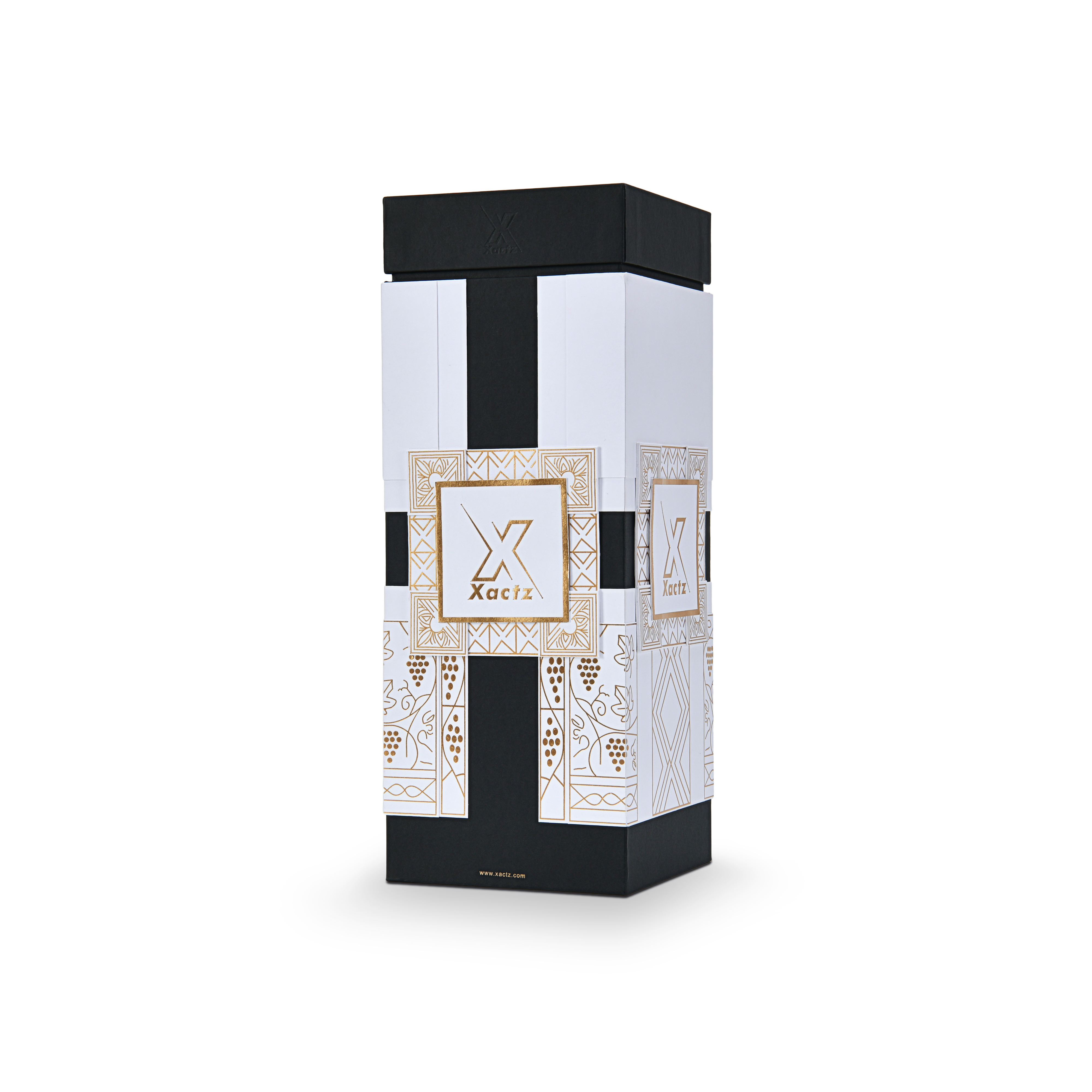 Three quarter angled view of a custom black rigid wine gift box with collared lid and base displaying the full gold foil geometric grape vine illustration wrapping around the white body panels with a matte black lid and collar