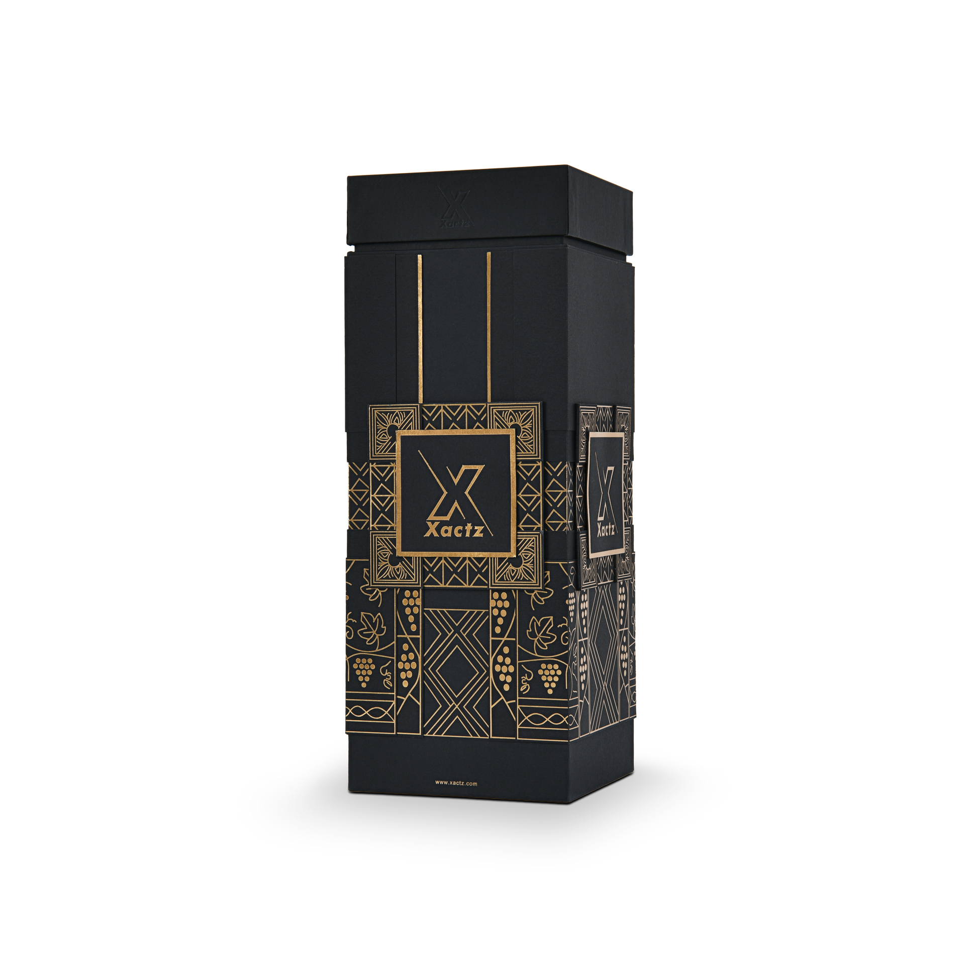 Three quarter angled view of a custom all black rigid wine gift box with collared lid and base displaying the gold foil grape vine and geometric pattern wrapping around all four black body panels with the debossed Xactz logo visible on the front and side panels