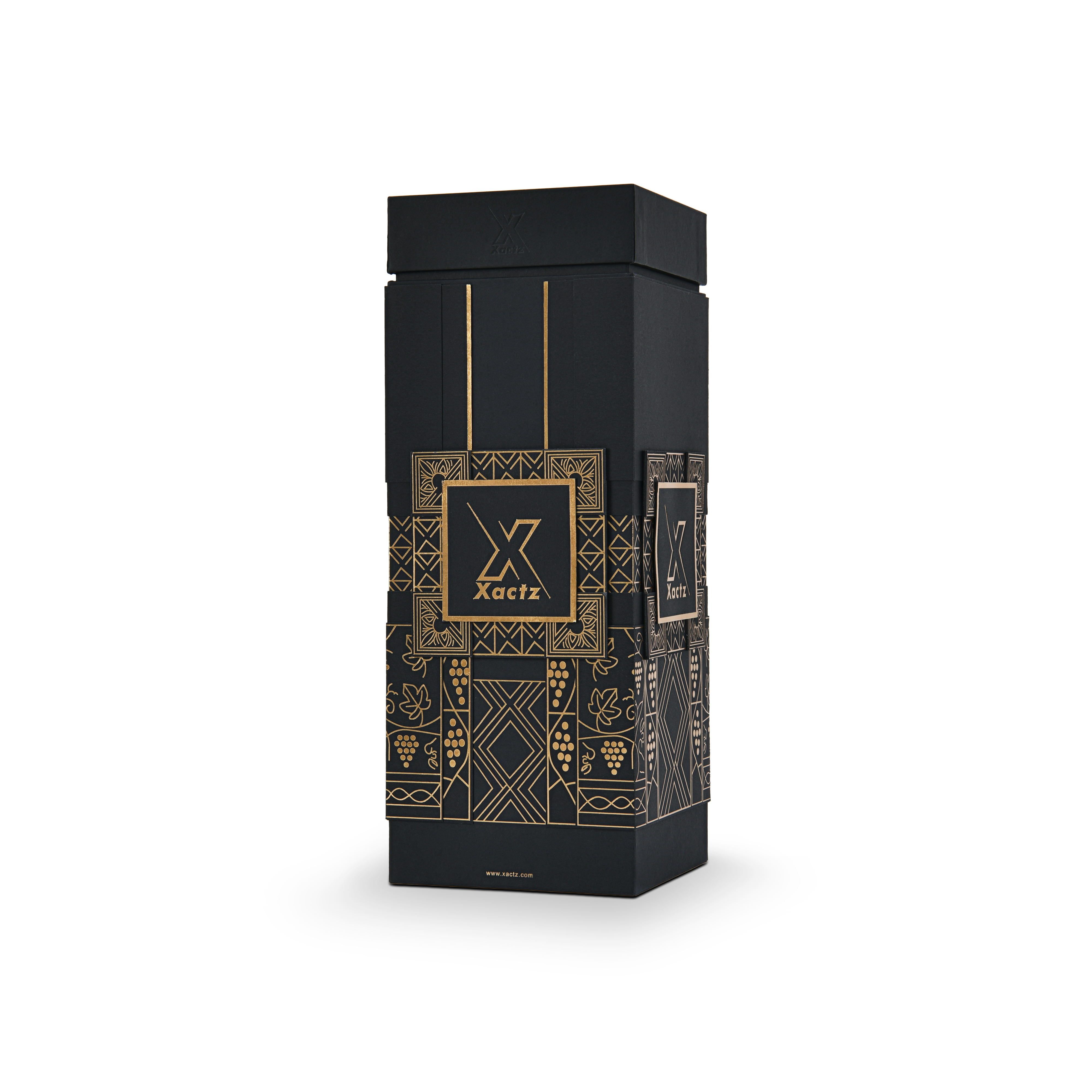 Three quarter angled view of a custom all black rigid wine gift box with collared lid and base displaying the gold foil grape vine and geometric pattern wrapping around all four black body panels with the debossed Xactz logo visible on the front and side panels