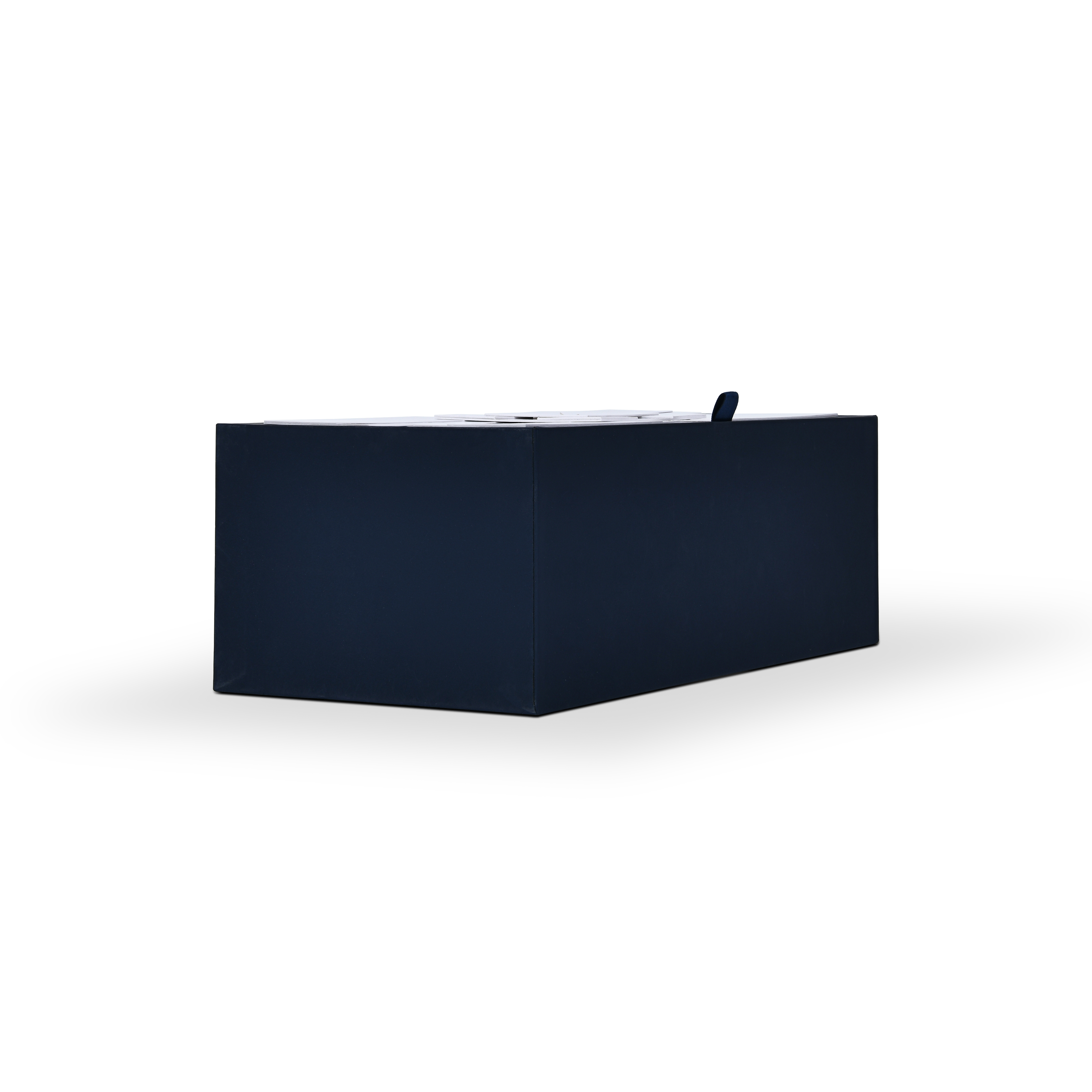 Side view of closed two-tone luxury wine gift box showing the seamless magnetic flip-top lid alignment and small blue ribbon pull.