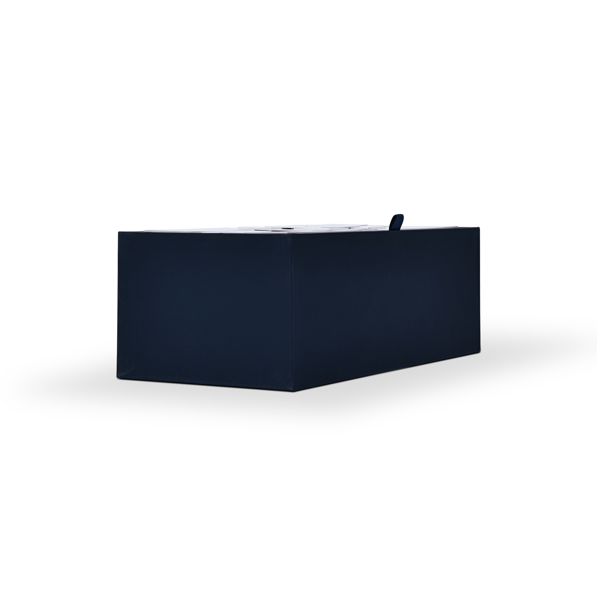 Side view of closed two-tone luxury wine gift box showing the seamless magnetic flip-top lid alignment and small blue ribbon pull.