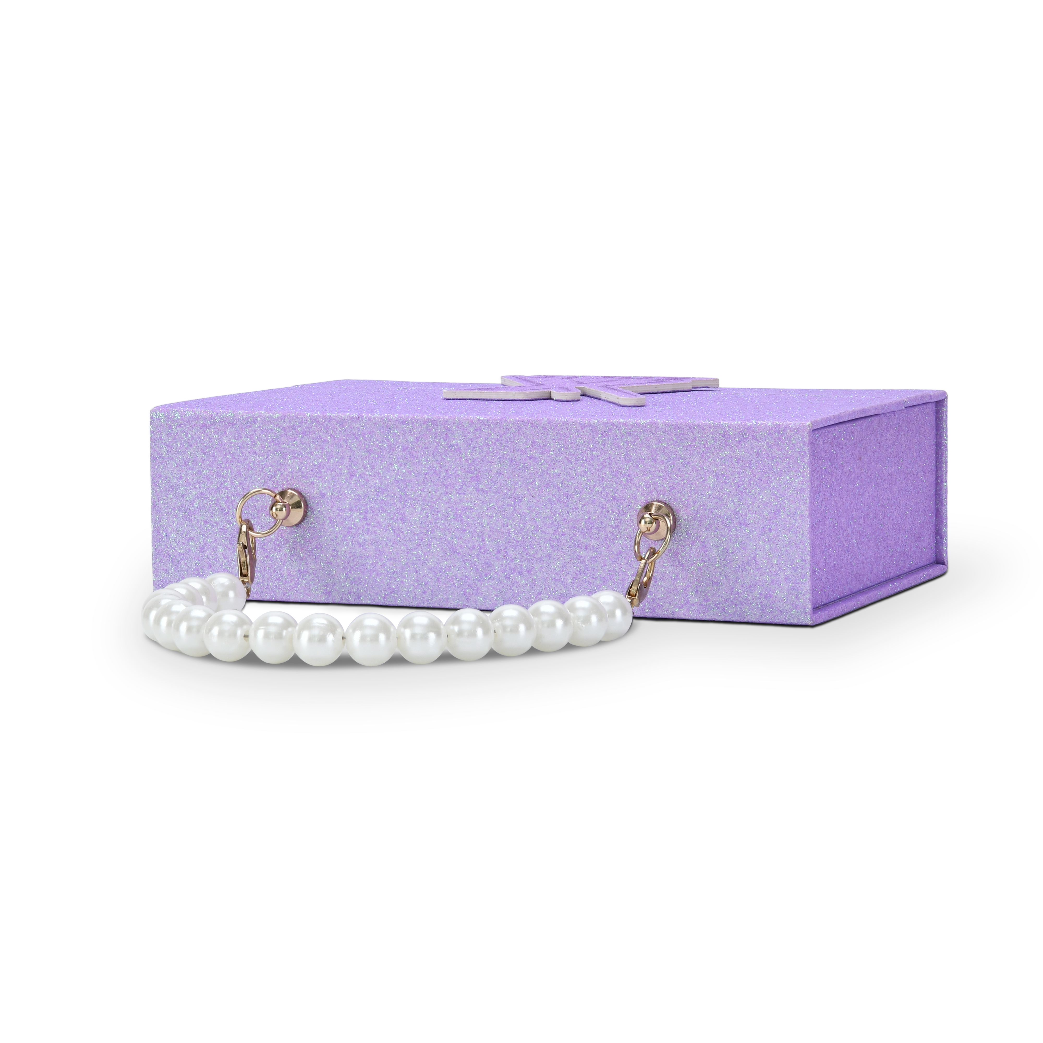 Side profile view of a custom purple glitter rigid makeup gift box with luxury packaging showing the box laid horizontally with the white pearl bead chain handle extended and attached to the gold hardware clips on the side panel displaying the full pearl chain handle construction and gold clasp detail