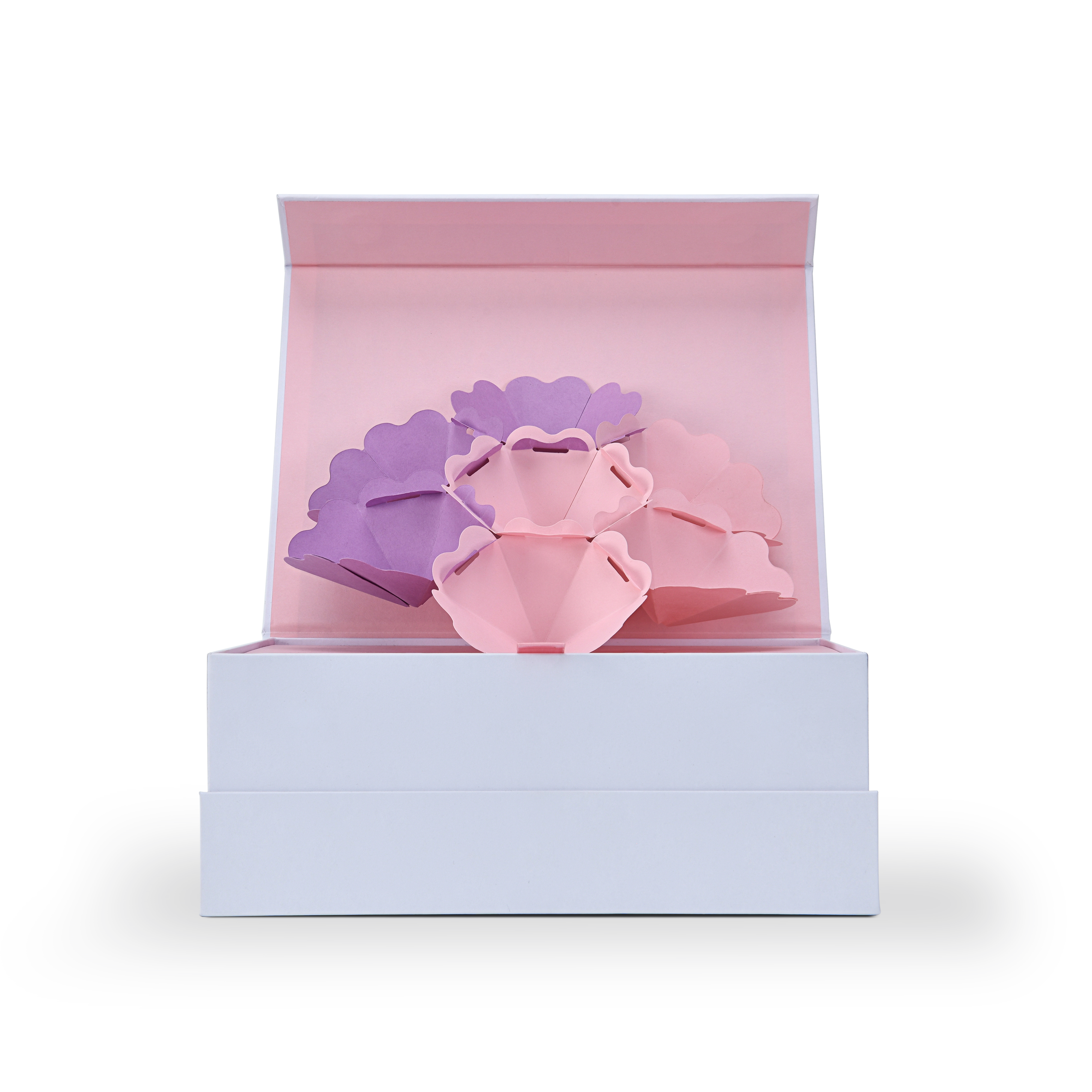 Front view of an opened magnetic gift box revealing a stunning 3D pop-up paper flower mechanism in pink and purple tones.