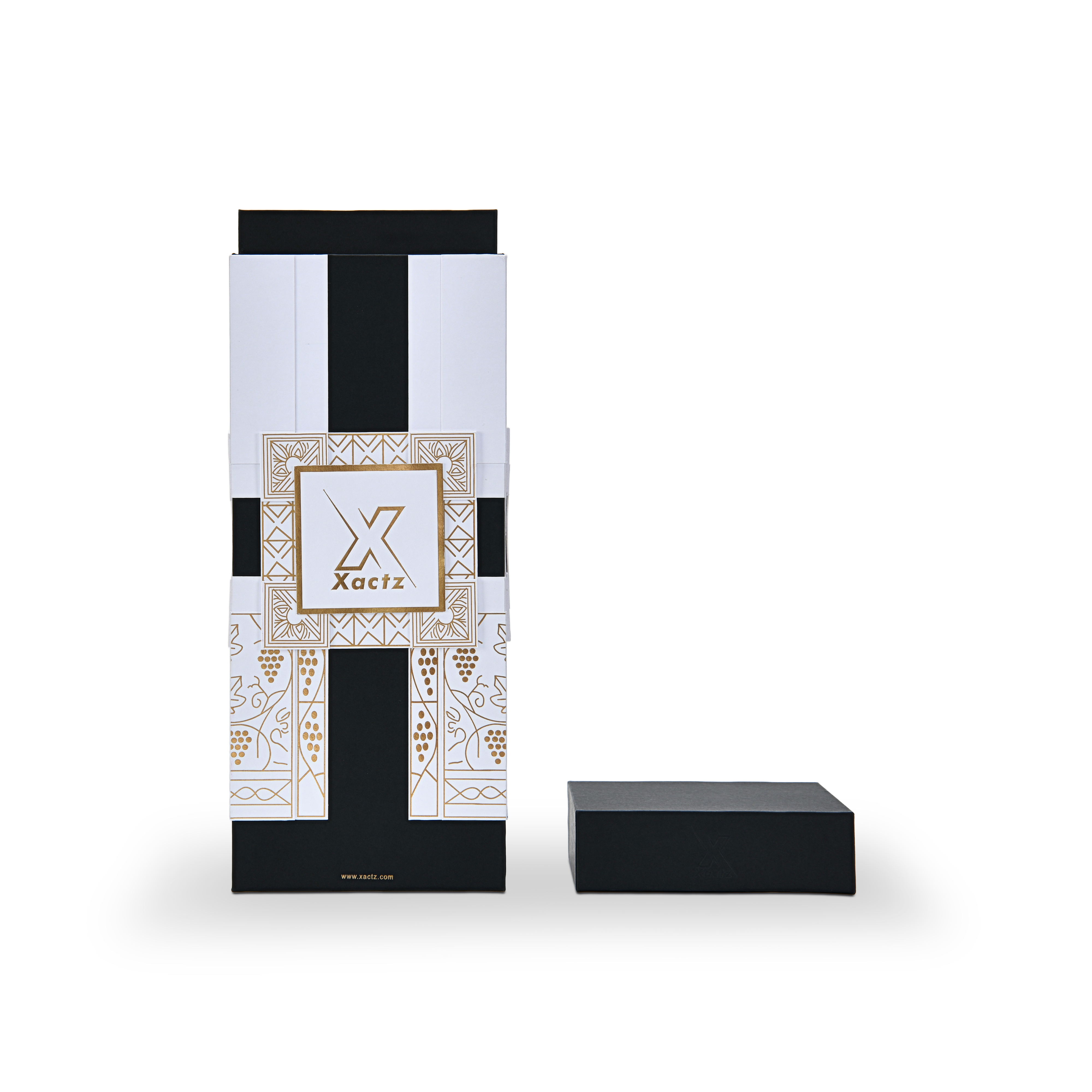 Front view comparison of two custom black rigid wine gift box designs side by side showing the white body version with gold foil grape vine illustration on the left and the all black body version with the same gold foil geometric grape vine pattern on the right both with matte black collared lids