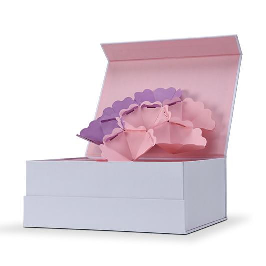 High-angle perspective view of the opened custom pop-up flower magnetic gift box, showcasing an interactive premium influencer unboxing experience.