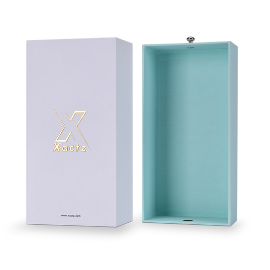 Xactz lavender-white drawer box beside fully open mint blue inner tray with silver pull knob, angled view.