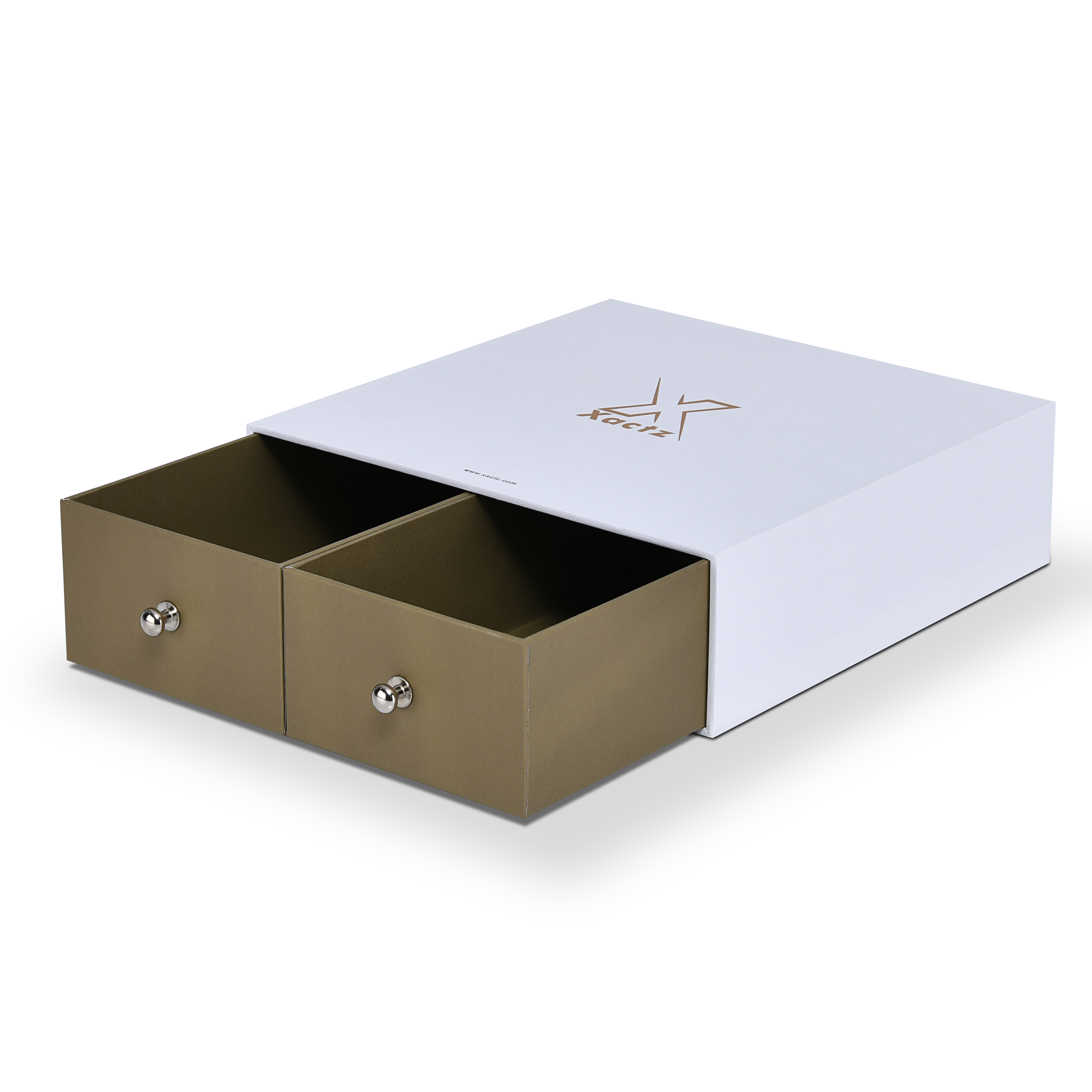 White Xactz rigid double-drawer box open at an angle showing two olive-tan inner trays with silver pull knobs.