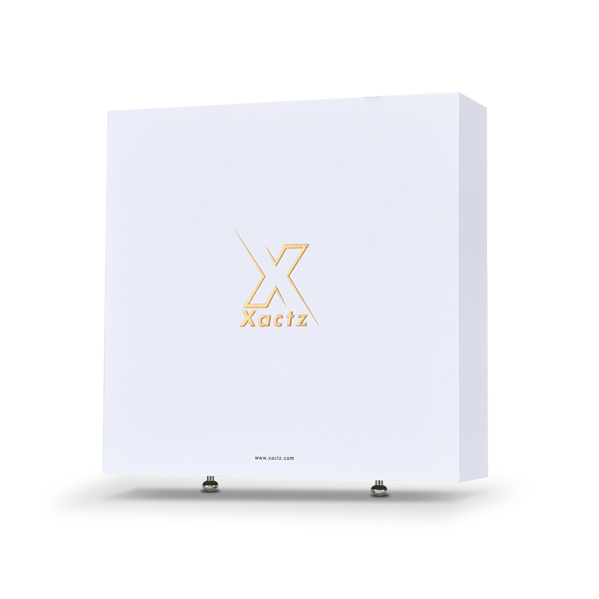 Large square white Xactz rigid drawer box with gold foil logo and two silver pull beads, three-quarter view.