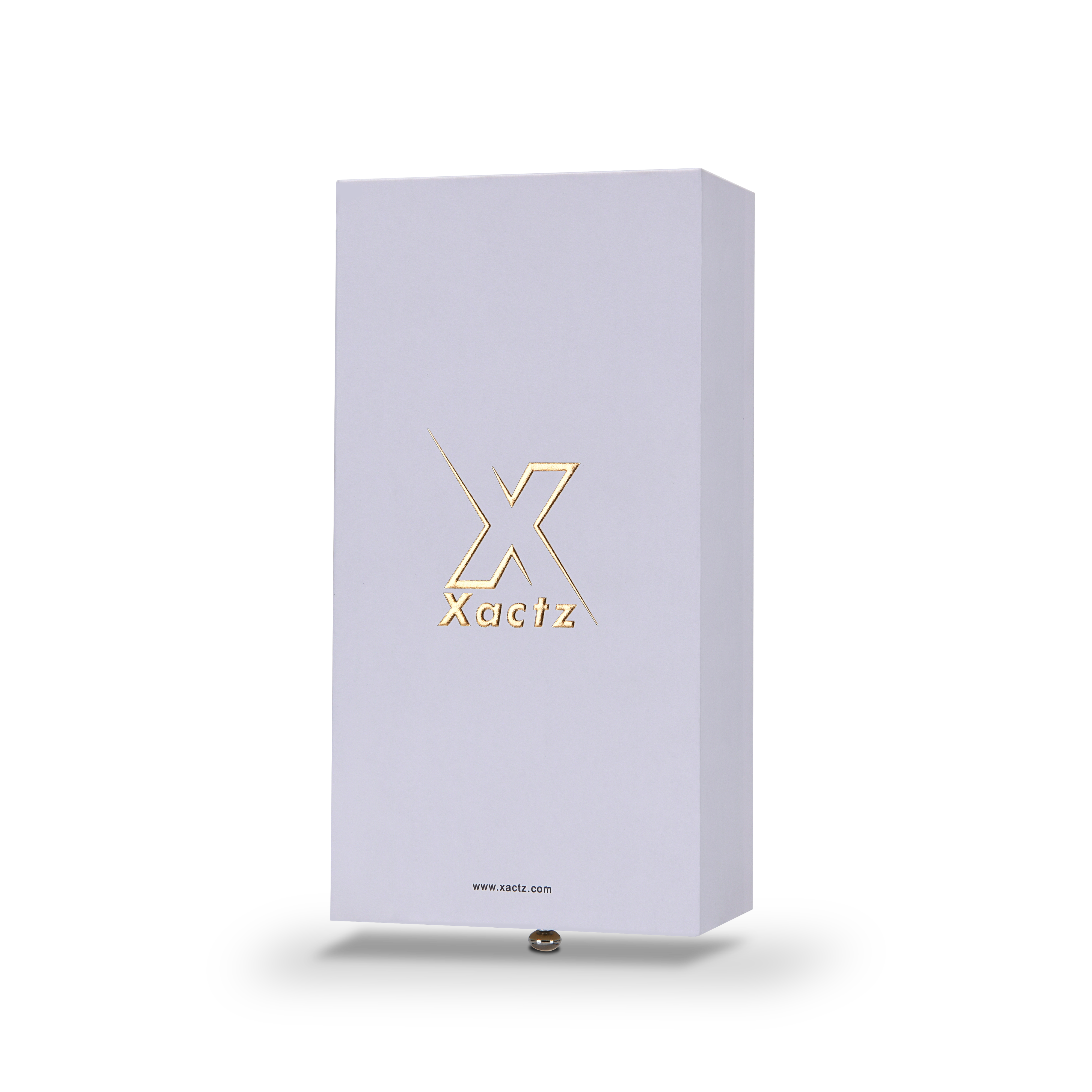 Lavender-white rigid drawer box with embossed matte gold foil Xactz logo, three-quarter angle view.